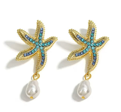 Gold starfish earrings with blue crystals and freshwater pearl drops