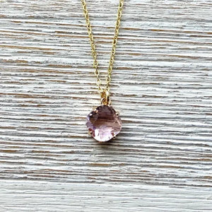 Gold chain necklace with pink solitaire gemstone pendant