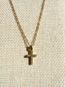 Gold cross necklace with cubic zirconia stones on chain