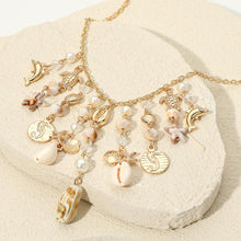 Load image into Gallery viewer, Gold Charm Necklace with Seashells &amp; Ocean Inspired Charms