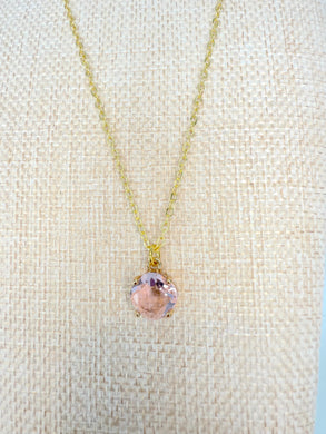 Gold chain necklace with pink solitaire gemstone pendant