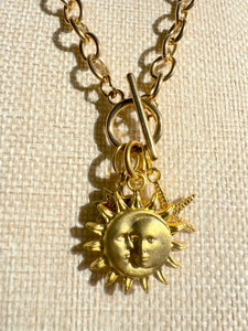 boho gold necklace with ocean and celestial charm